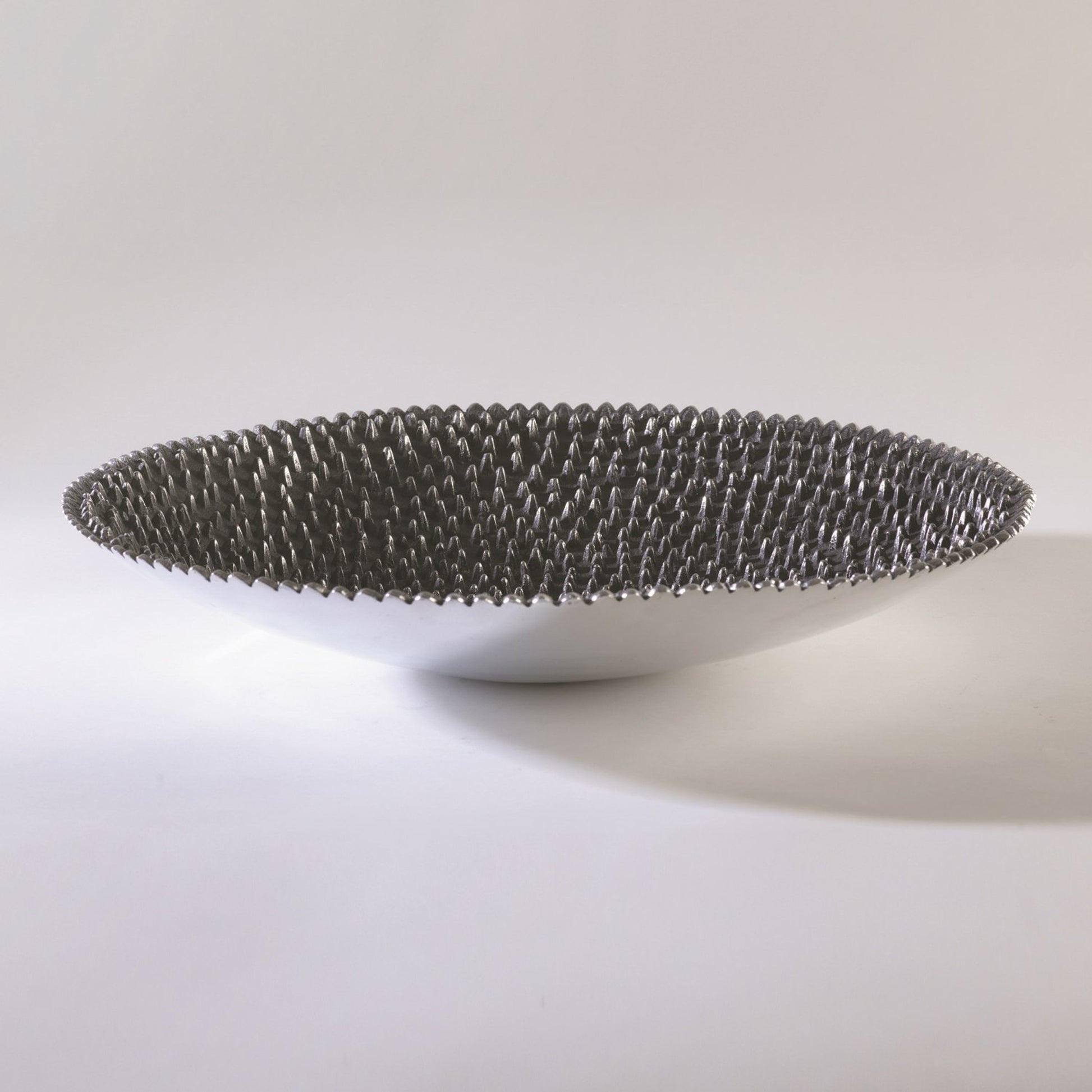Jack Charger by Global Views. Made from cast aluminum in a eclectic & global style.