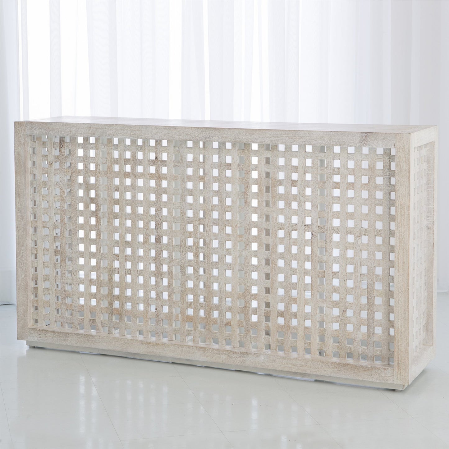 003 SR-701107 | Lifestyle | Driftwood Lattice Console by Global Views in white washed. Made from mango in a coastal style.