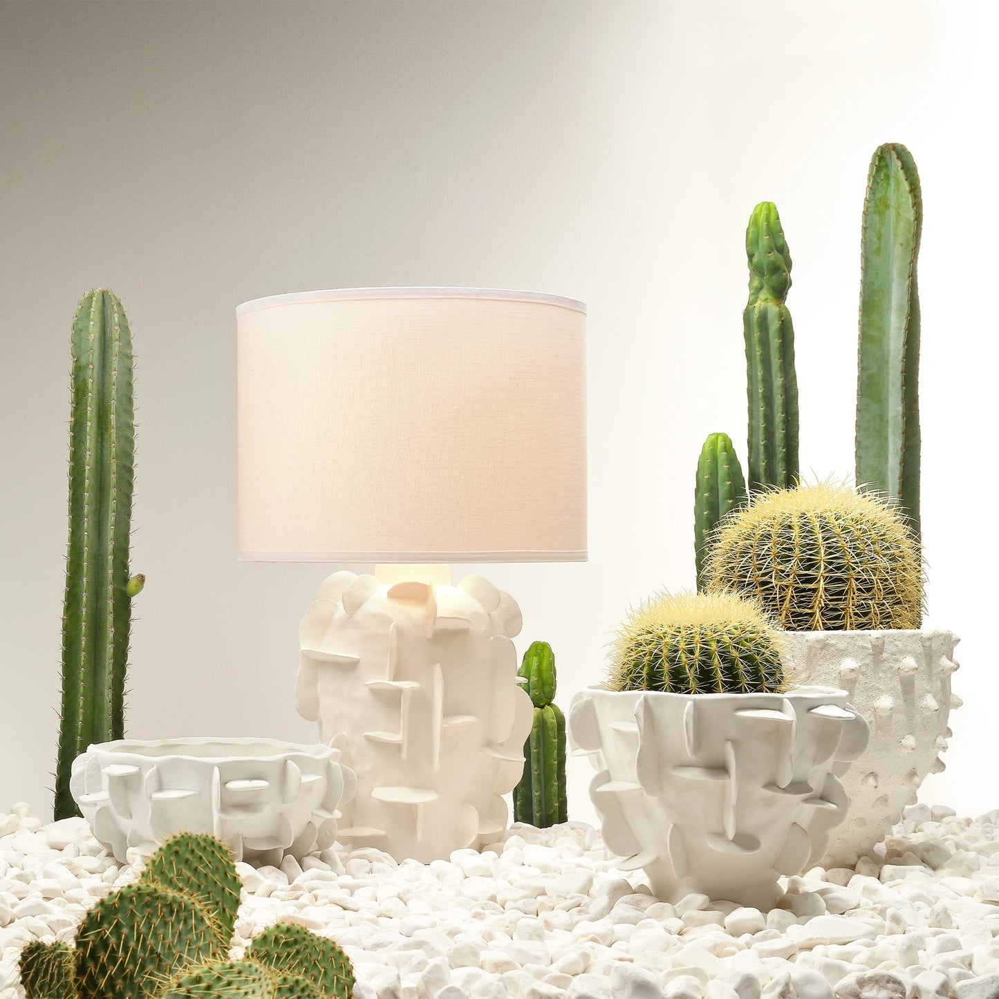 007 SR-819728 | Lifestyle | Spike Vase by Jamie Young in textured matte white. Made from ceramic in a coastal style.