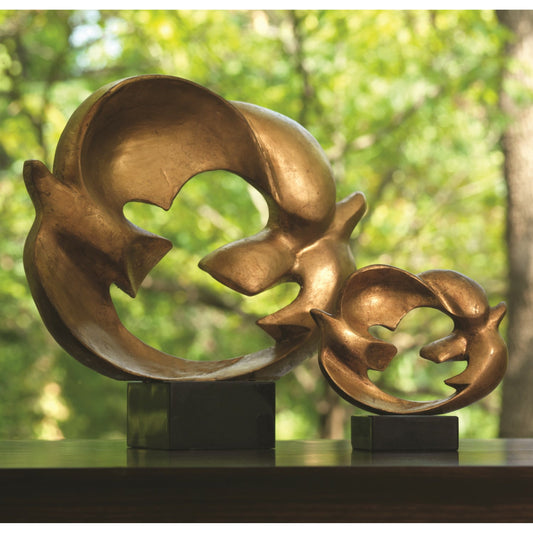 Doves of Peace Sculpture by Global Views in gold. Made from cast iron, granite in a transitional style.