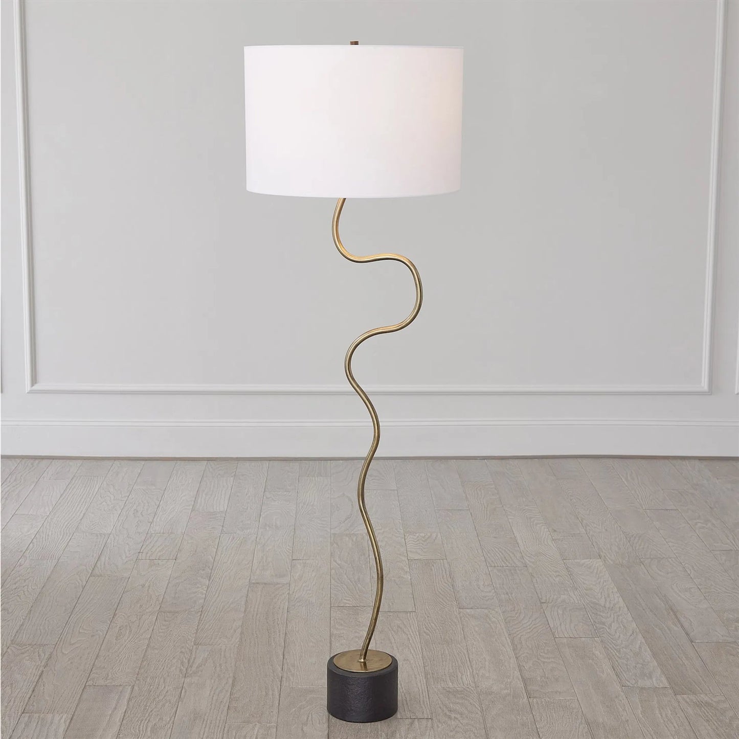 005 SI-2323919 | Lifestyle | Loop Floor Lamp by Global Views in black, white, off-white, tan and brass. Made from unique in a unique style.
