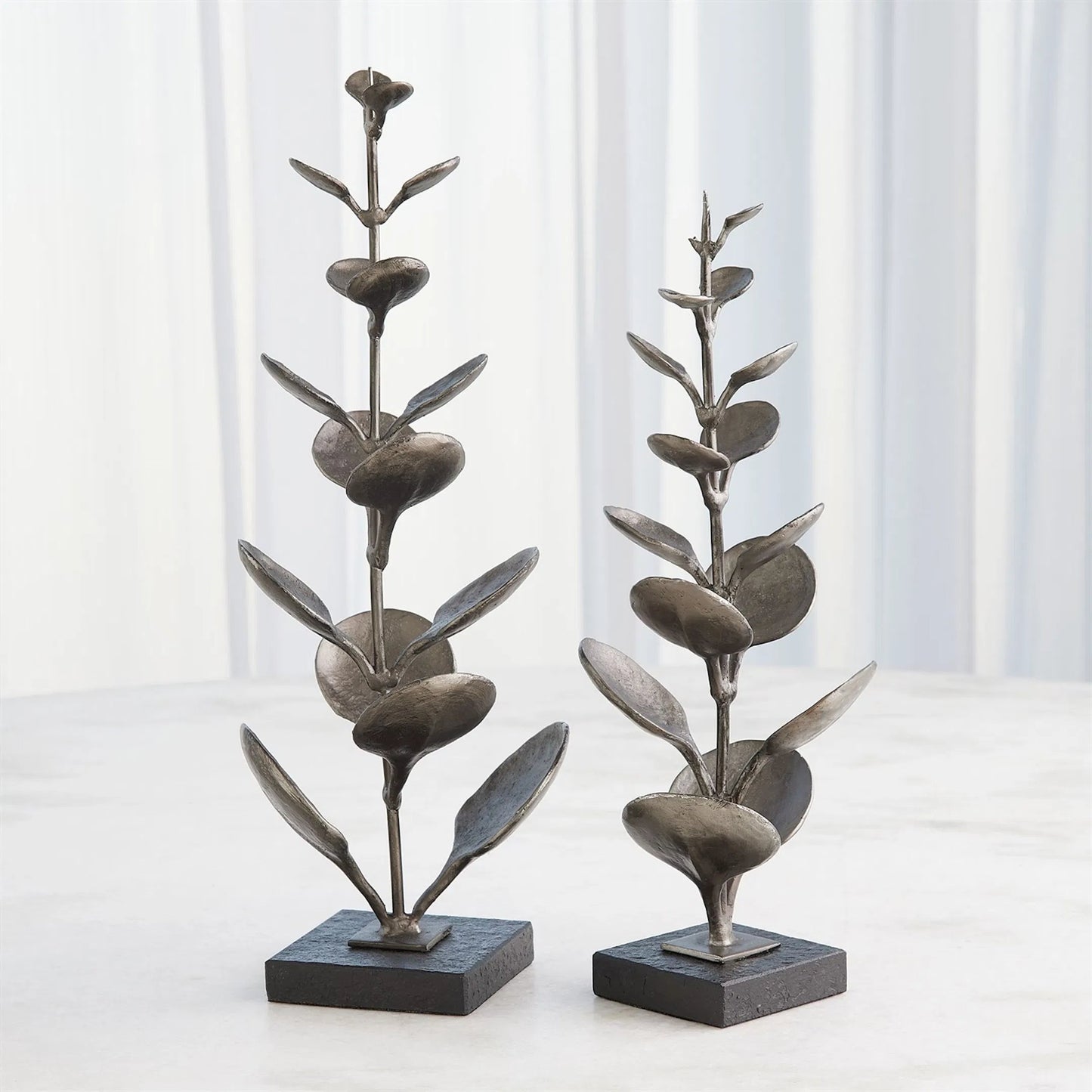003 SI-2323901,SI-2323902 | Unknown | Liana Sculpture by Global Views in black and marble. Made from unique in a unique style.