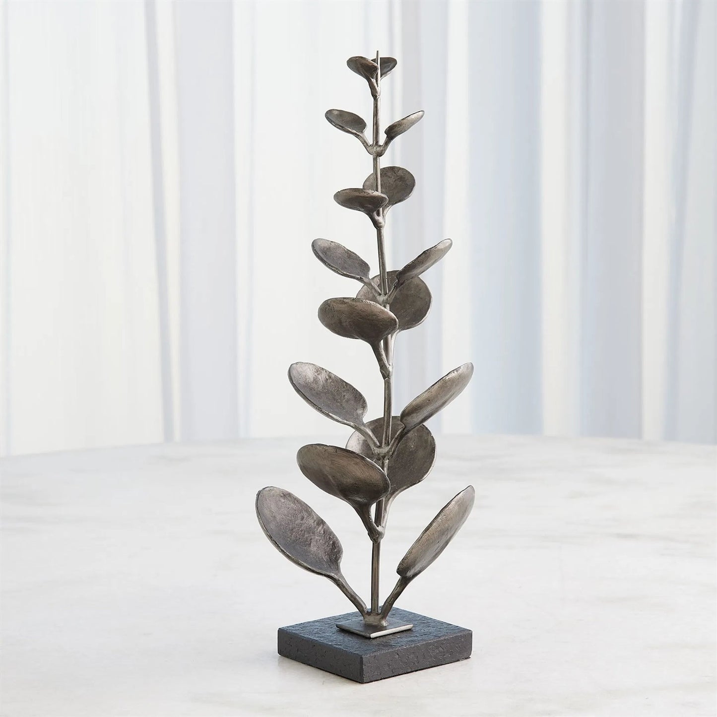 004 SI-2323901,SI-2323902 | Unknown | Liana Sculpture by Global Views in black and marble. Made from unique in a unique style.