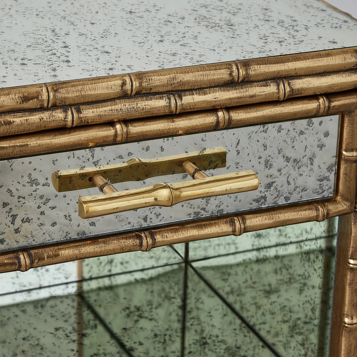 005 SI-2446091 | Closeup | Bamboo Bedside Chest by Global Views. Made from mango wood, mdf, brass in a rustic style.