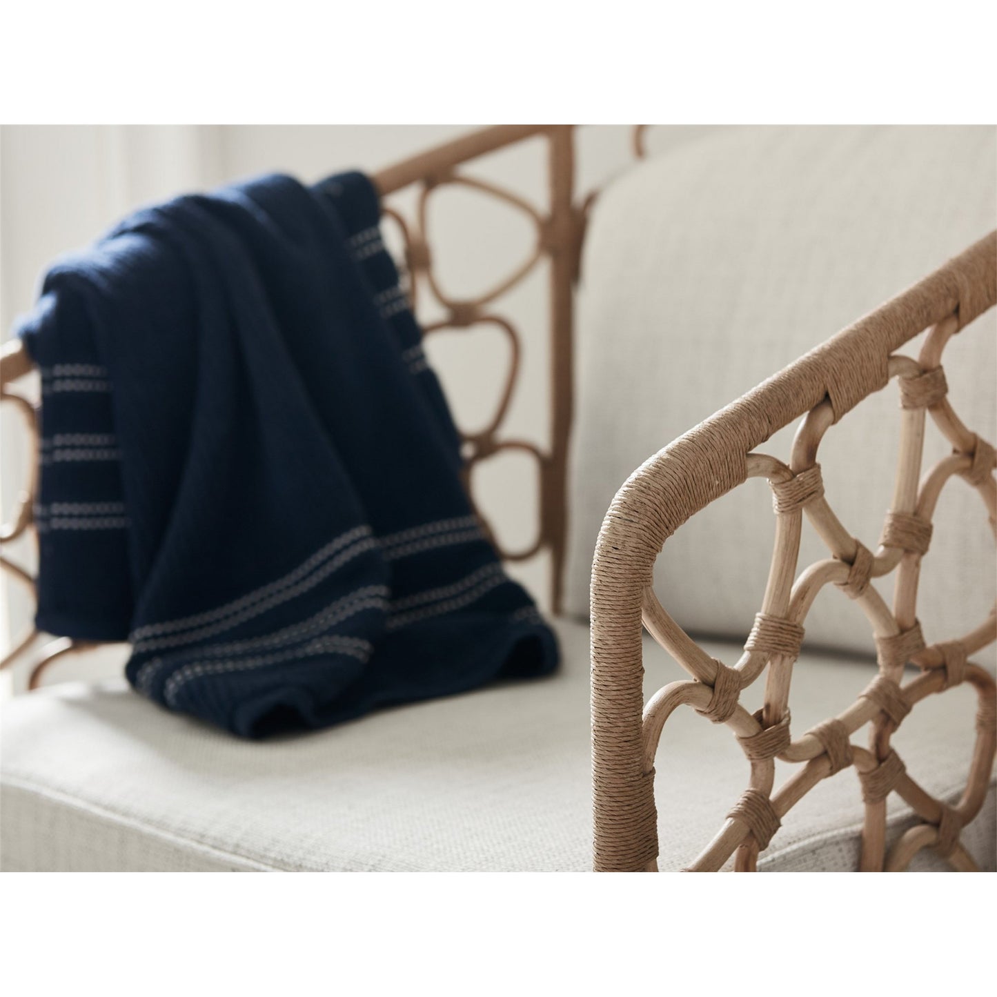 006 SR-813122 | Lifestyle | Coastal Living Pebble Accent Chair by Coastal Living by Universal Furniture in na and rattan, dover natural. Made from 96% polyester, 2% nylon, 2% cotton in a coastal style.