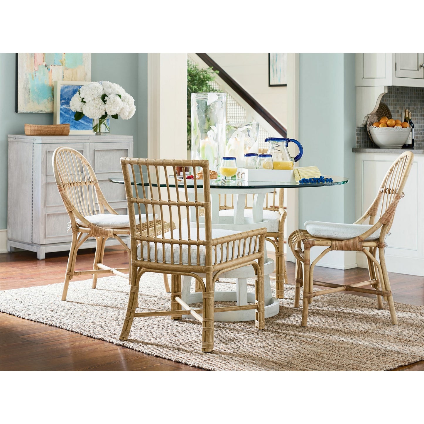007 SR-813129 | Lifestyle | Coastal Living Round Glass Table 54" by Coastal Living by Universal Furniture in na and sandbar. Made from unique in a coastal style.