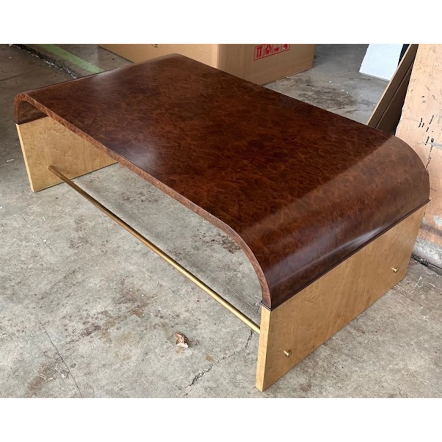 003 SI-2239011 | Lifestyle | Jaguar Cocktail Table by Maitland-Smith in walnut burl, birdseye maple. Made from unique in a traditional style.