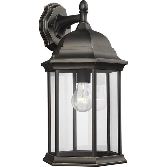 Sevier Large One-Light Downlight Outdoor Wall Lantern by Visual Comfort & Co. in clear glass. Made from die cast aluminum, glass in a cottage & farmhouse style.