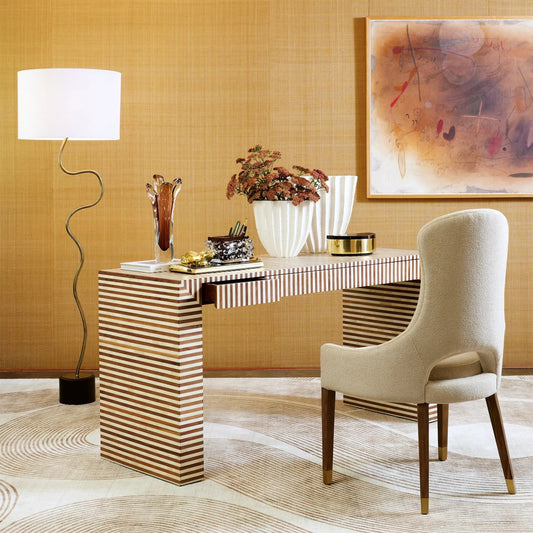 Loop Floor Lamp by Global Views in black, white, off-white, tan and brass. Made from unique in a transitional style.