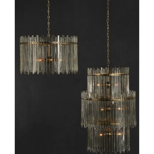 Electra Chandelier by Currey and Company in clear, antique brass. Made from glass, iron in a modern style.