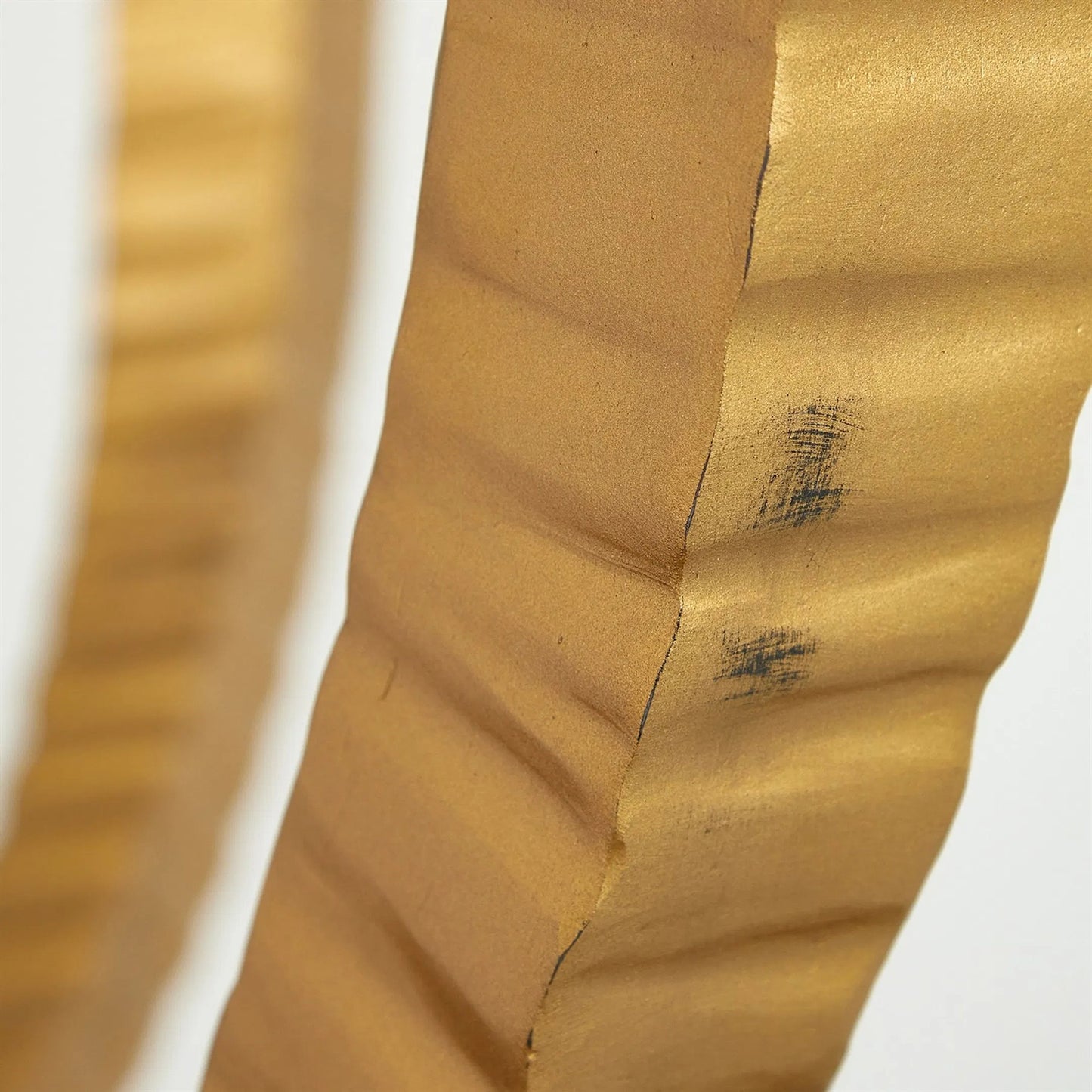 004 SR-702179 | Closeup | Teton Rectangular Table by Global Views in gold. Made from hand-forged iron, tempered glass in a transitional style.