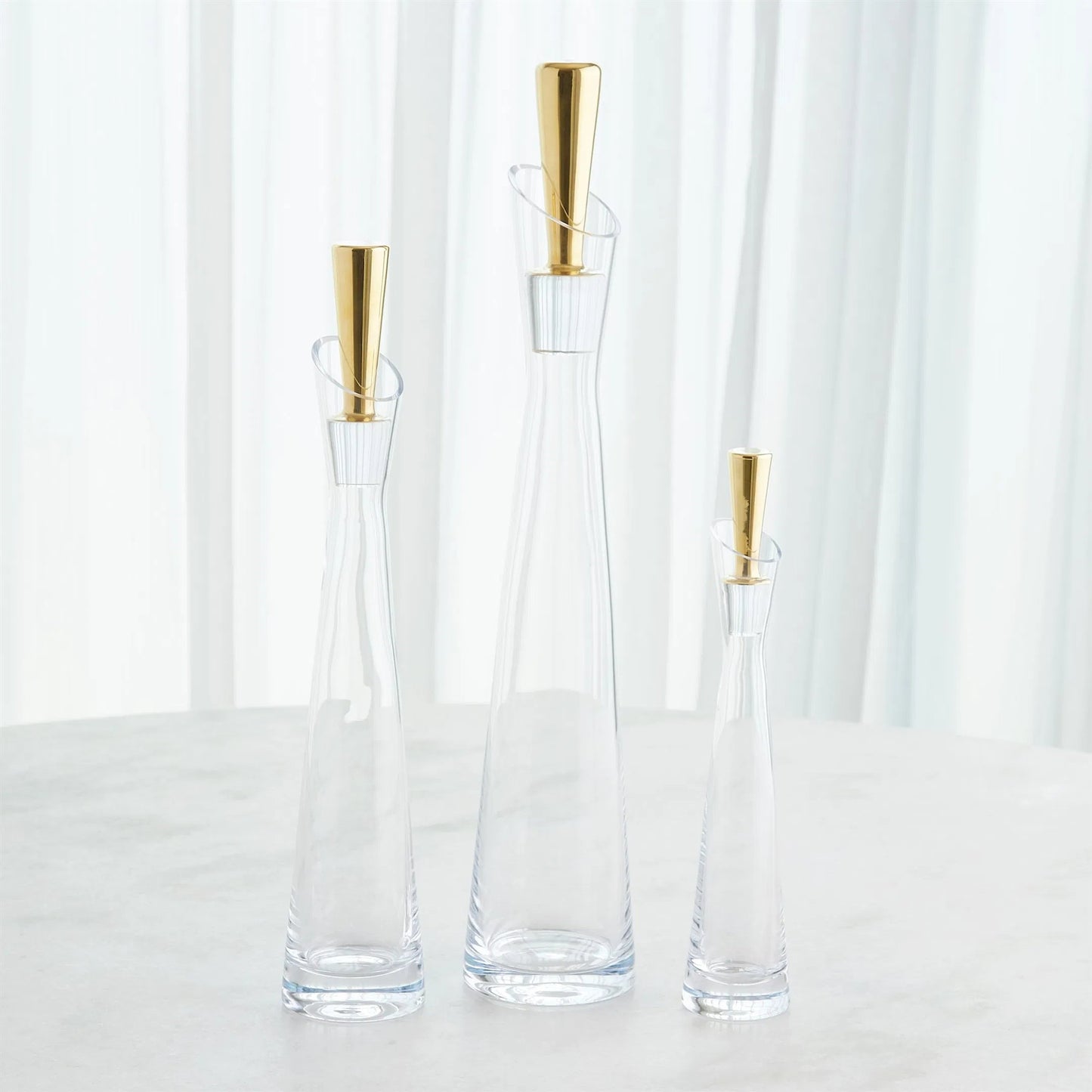 017 SI-2445635,SI-2445636,SI-2445637 | Additional Silo | Slant Decanter by Global Views. Made from glass in a transitional style.