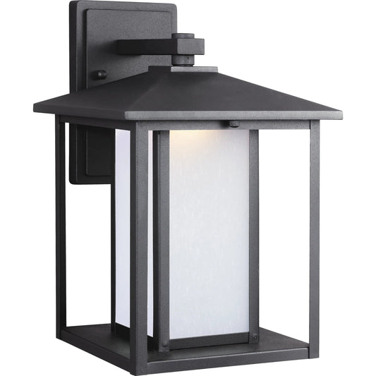 Hunnington Large LED Outdoor Wall Lantern by Visual Comfort & Co. in black. Made from aluminum in a cottage & farmhouse style.