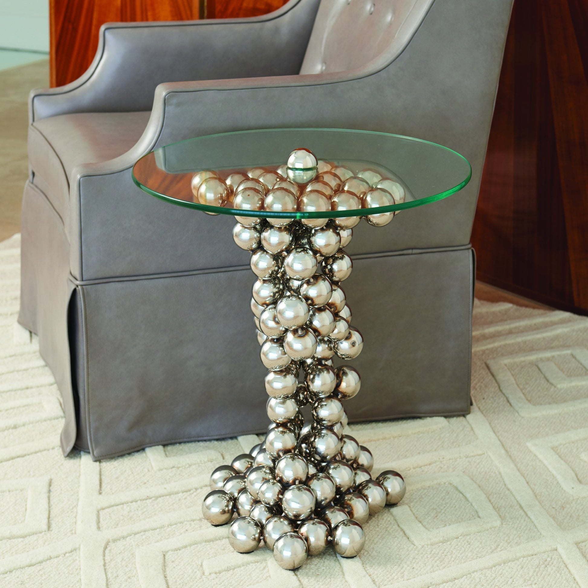Sphere Table by Global Views in nickel. Made from steel, tempered glass in a modern style.