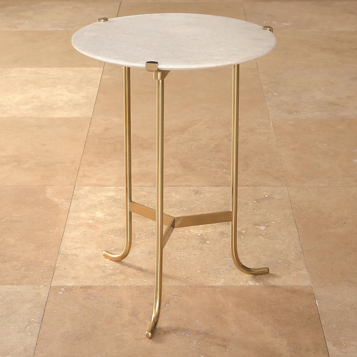 002 SR-701892 | Lifestyle | Plie Table by Global Views in brass. Made from brass, white honed marble in a transitional style.
