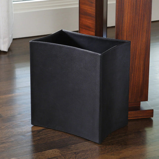 Folded Leather Wastebasket by Global Views. Made from leather in a modern style.