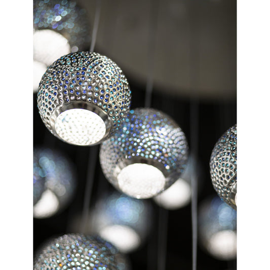 Giro Pendant by Currey and Company in painted silver, nickel, blue. Made from metal, glass bead in a modern style.