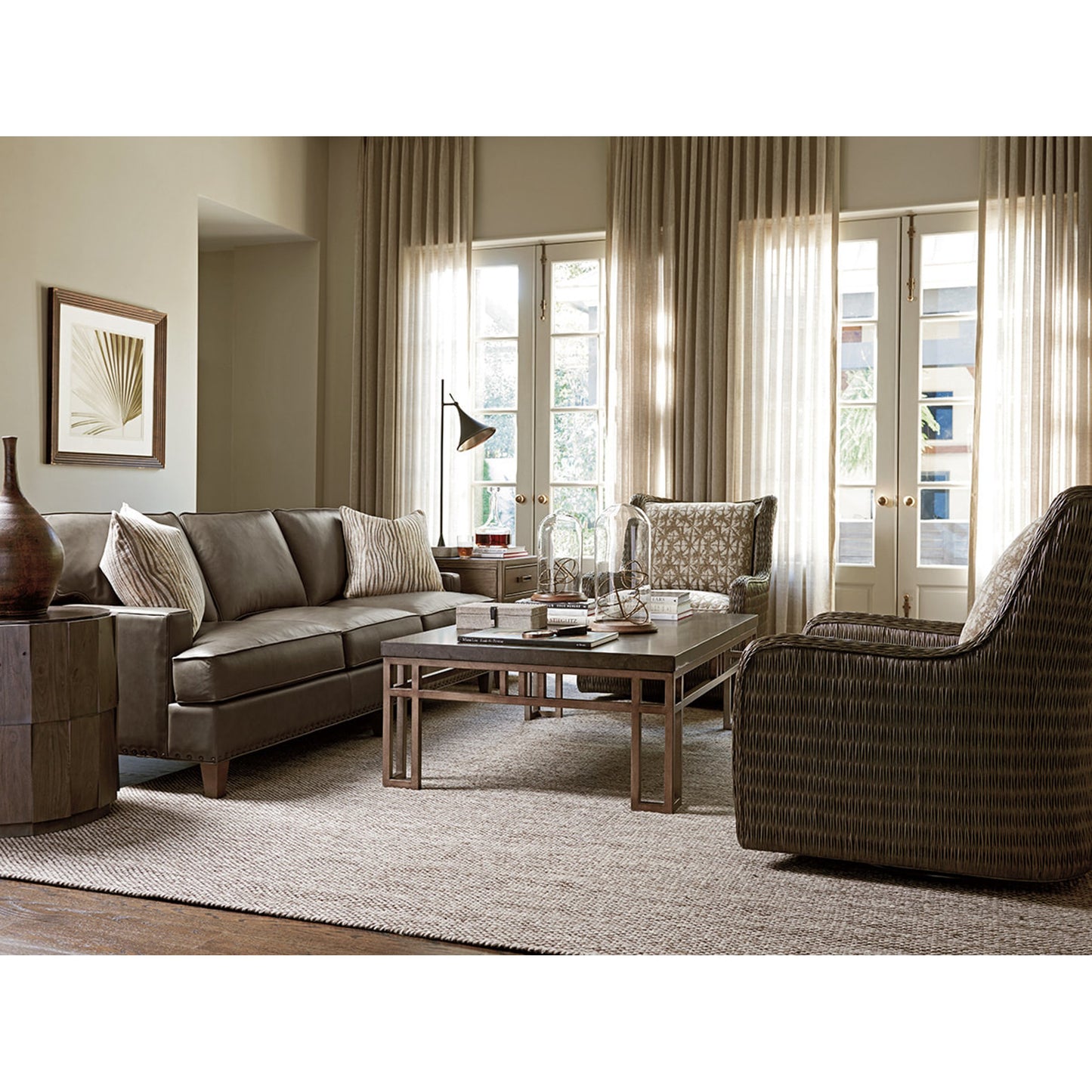 004 SR-836093 | Lifestyle | Everett Round Travertine End Table by Tommy Bahama Home. Made from unique in a eclectic & global style.