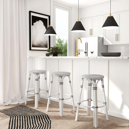 Tobias Bar Stool by Butler Specialty Company. Made from rattan, polyurethane synthetic rattan in a coastal style.