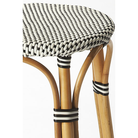 Tobias Wood Bar Stool by Butler Specialty Company. Made from rattan, polyurethane synthetic rattan in a coastal style.