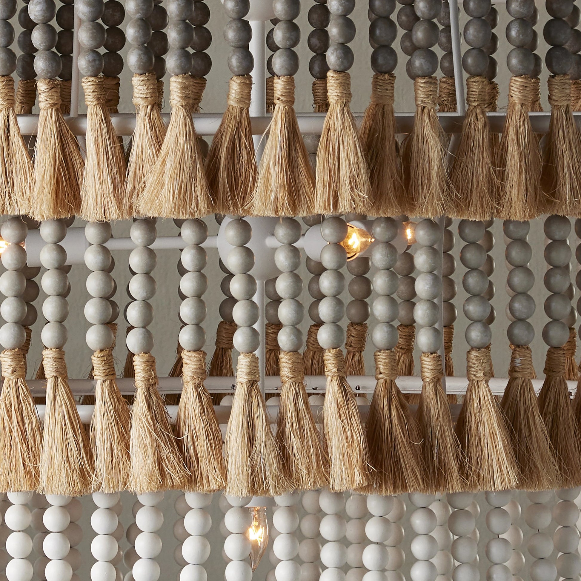 St. Barts Chandelier by Currey and Company in mist blue, demin blue. Made from wrought iron, wood beads, abaca rope in a coastal style.