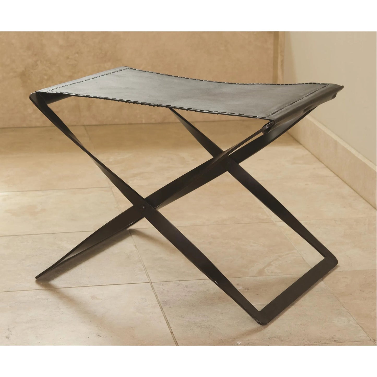 002 SR-701250 | Lifestyle | Folding Stool by Global Views in dark brown powder coated. Made from iron in a modern style.