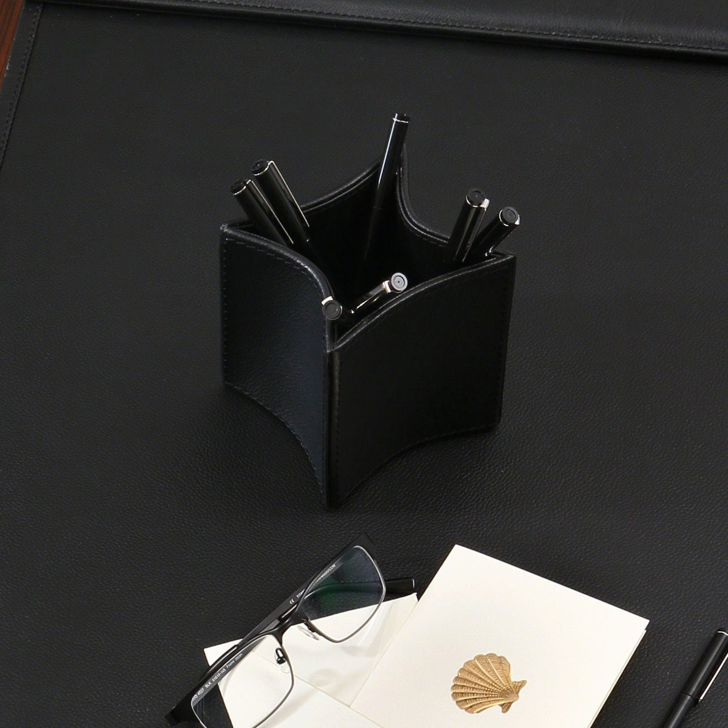 007 SR-891969 | Lifestyle | Folded Pencil Cup by Global Views. Made from leather in a modern style.