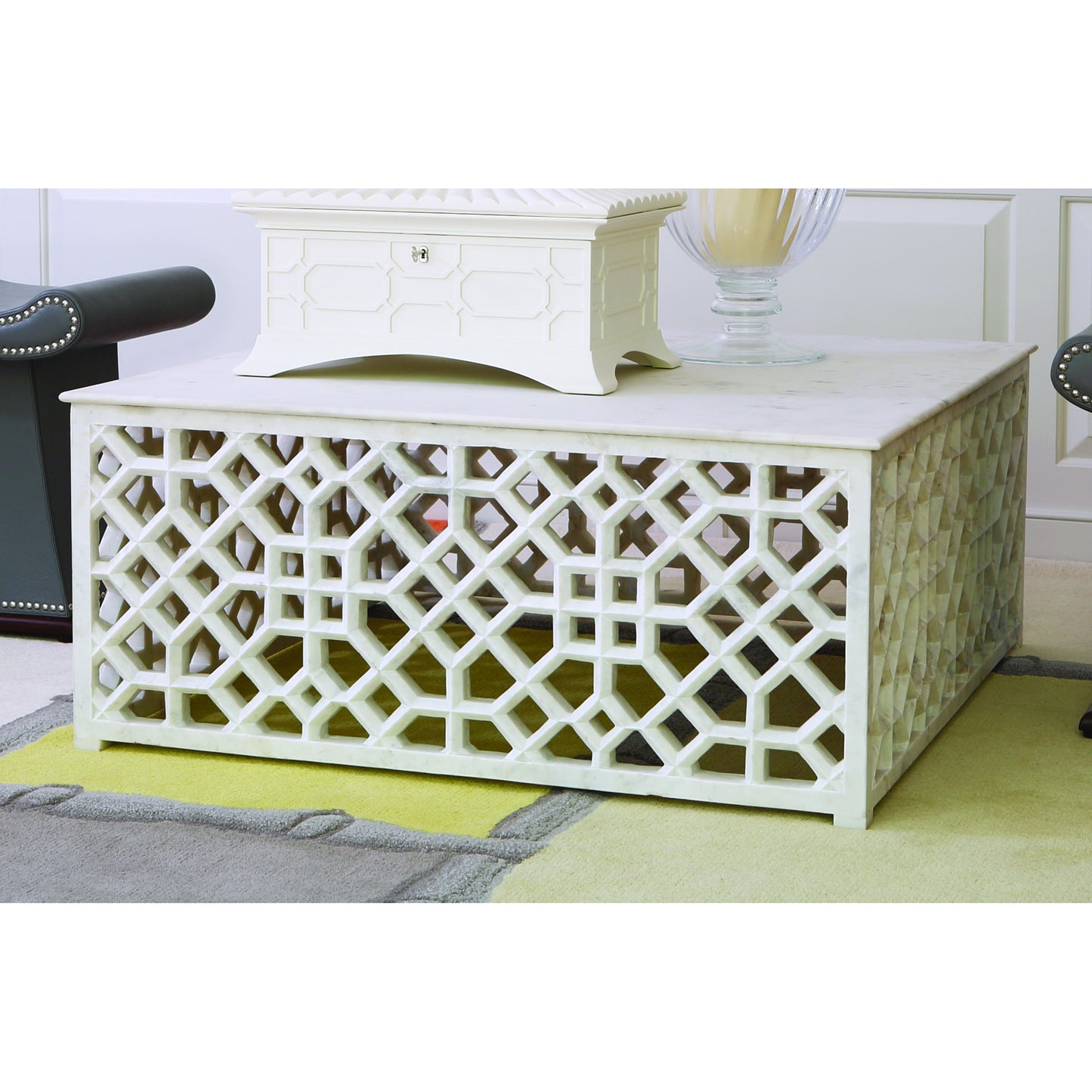 002 SR-701277 | Lifestyle | Fret Cocktail Table by Global Views. Made from hand carved honed white marble in a transitional style.