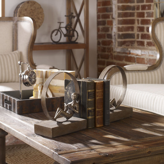 Lounging Reader Antique Bookends (Set of 2) by Uttermost. Made from metal, mdf, resin in a modern style.
