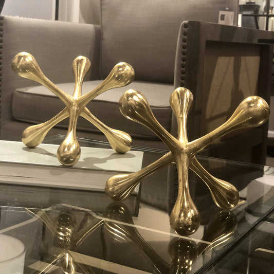 Harlan Brass Objects by Uttermost. Made from aluminum in a modern style.