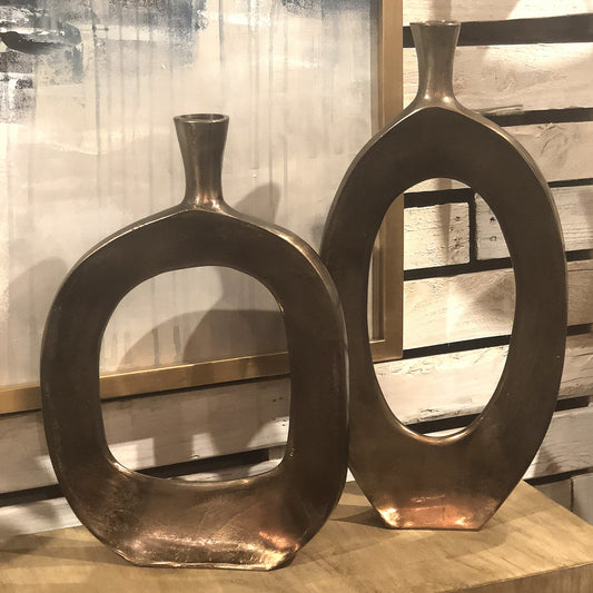 Kyler Vases by Uttermost in bronze. Made from aluminum in a eclectic & global style.