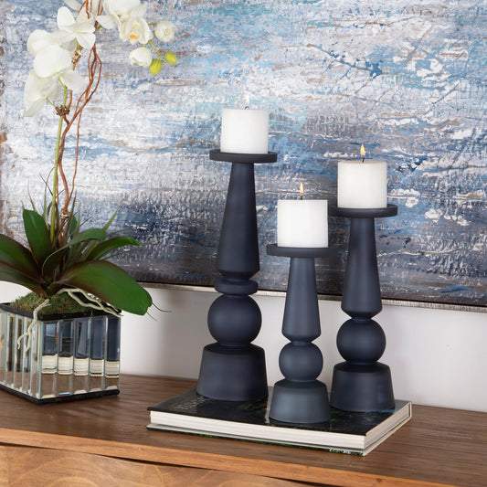 Cassiopeia Candleholders by Uttermost. Made from glass in a modern style.