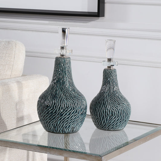 Almera Dark Bottles by Uttermost in teal. Made from ceramic, crystal, iron in a coastal style.