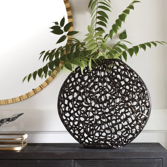 Web Vase by Uttermost in dark bronze. Made from cast aluminum in a modern style.