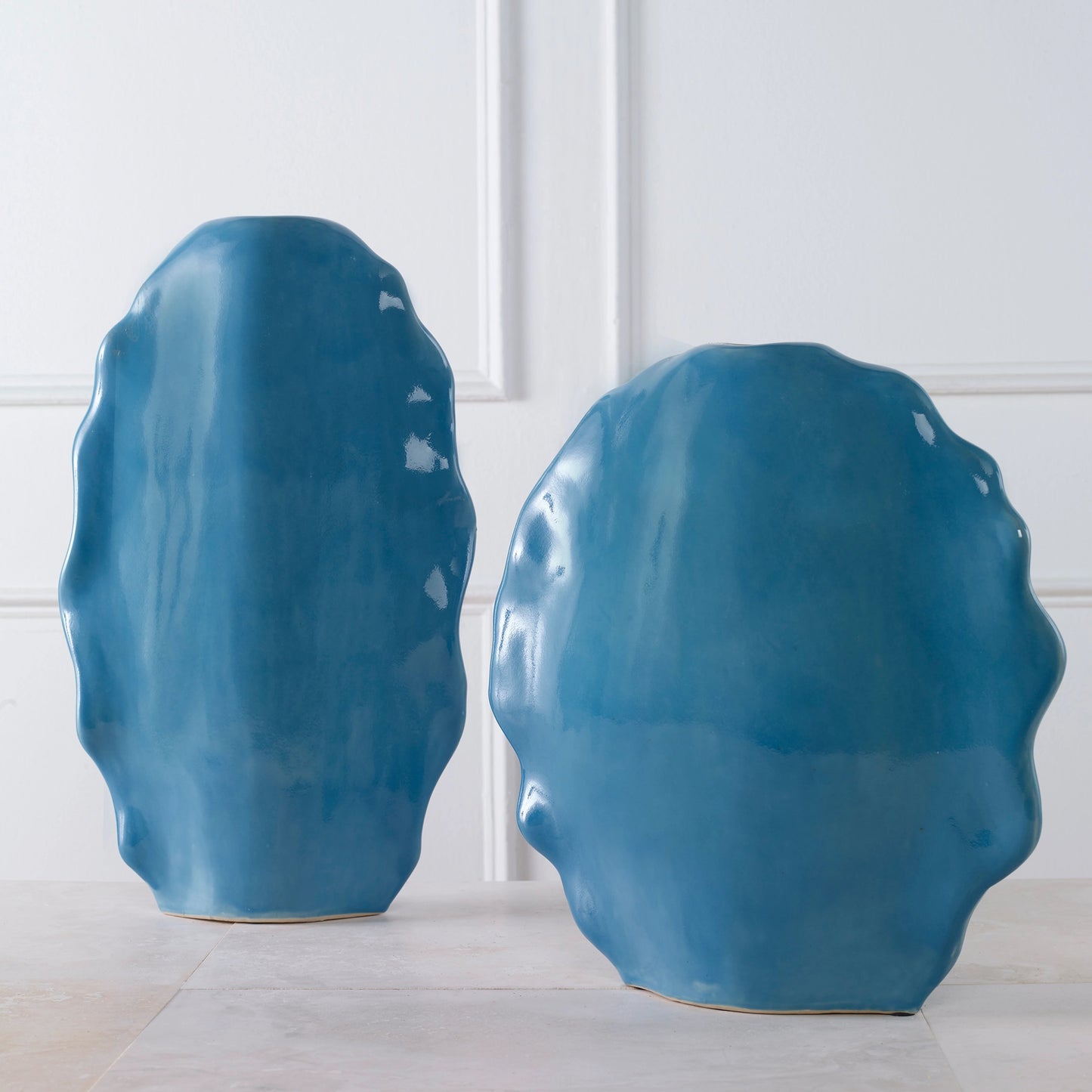 009 SI-1981248 | Lifestyle | Ruffled Feathers Vases by Uttermost. Made from earthenware in a transitional style.