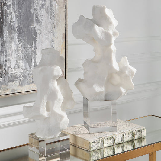 Remnant Sculptures by Uttermost in white. Made from man-made stone, crystal in a modern style.