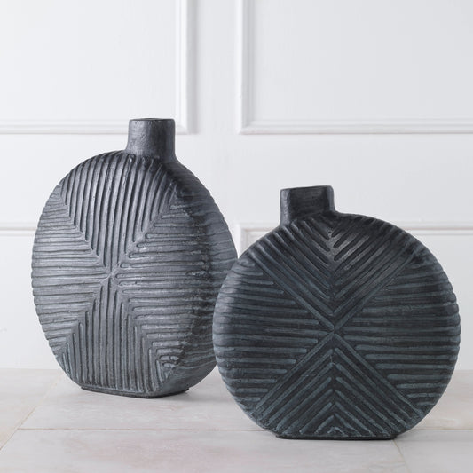 Viewpoint Vases by Uttermost in aged black. Made from grc in a modern style.