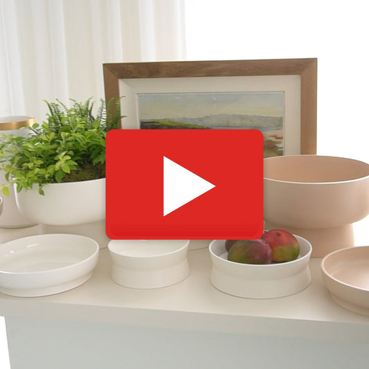 Encircle Low Bowl by Global Views in chalk. Made from ceramic in a coastal style.