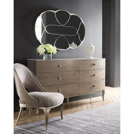 Lillian Double Dresser by Caracole in natural and stone manor, ivory wash, soft radiance. Made from birch, koto, figured sycamore in a modern style.
