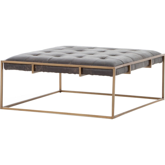 Oxford Square Coffee Table by Four Hands in rialto ebony, antique brass. Made from top grain leather, iron, 100% polyester in a modern style.