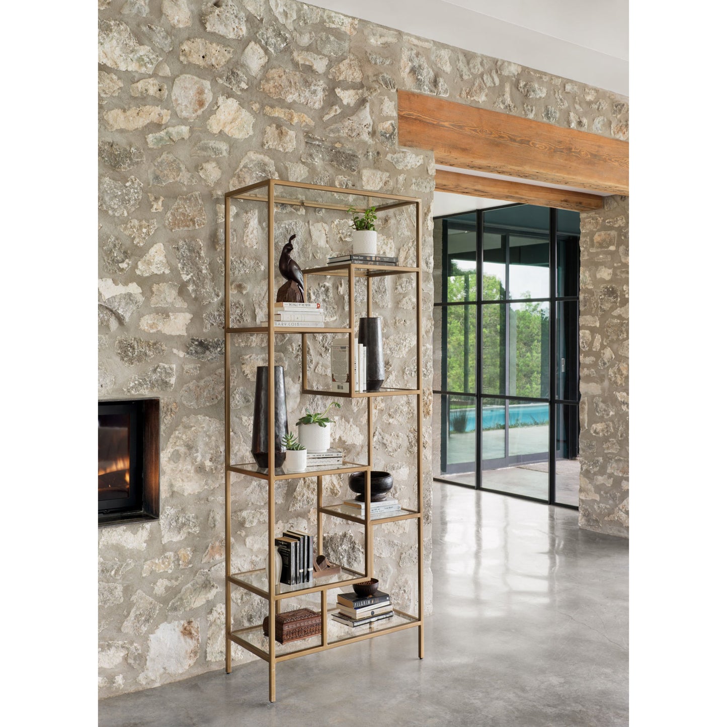 008 S-279347 | Lifestyle | Helena Bookcase by Four Hands in antique brass, clear glass. Made from iron, tempered glass in a cottage & farmhouse style.
