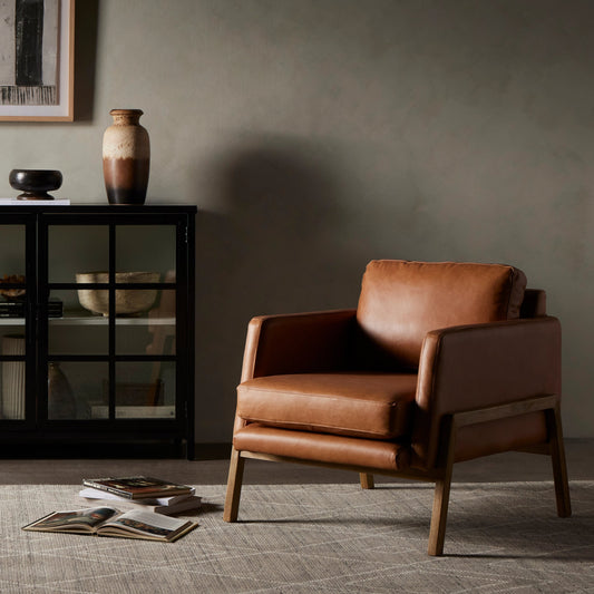 Diana Chair by Four Hands in sonoma butterscotch. Made from top grain leather, solid parawood, 100% polyester in a modern style.