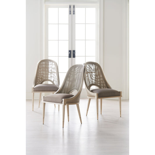 Cane I Join You by Caracole in gold and neutral metallic. Made from birch, woven cane in a transitional style.