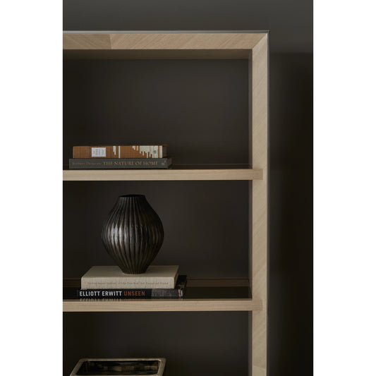 High Rise by Caracole in champagne and moonstone, deep bronze, seal skin. Made from birch, metal, glass, koto in a modern style.