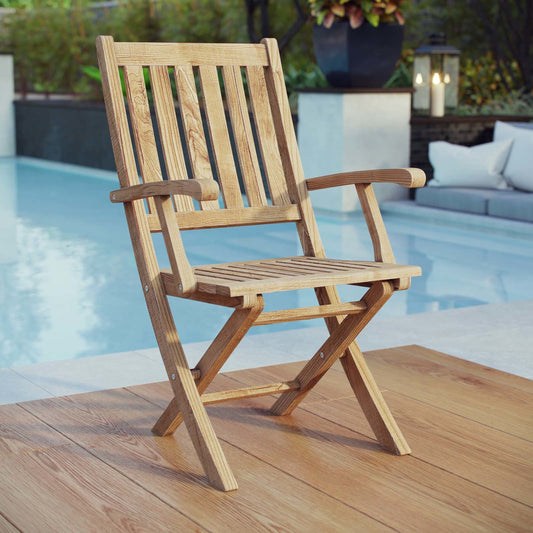 Andover Teak Folding Chair by Evans & Londeen in natural. Made from teak solid wood, folded, chair weight capacity 441 lbs in a modern style.