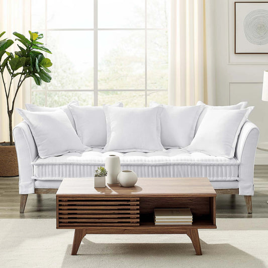 Wabush Sofa by Evans & Londeen in white. Made from 2int foam density 62lbs, m3, 3int foam density 67lbs, 1int foam density 40lbs, silk cotton, non-woven fabric cover, 7pcs of pillows with size 23.5*23.5in.filling with fiber, ru