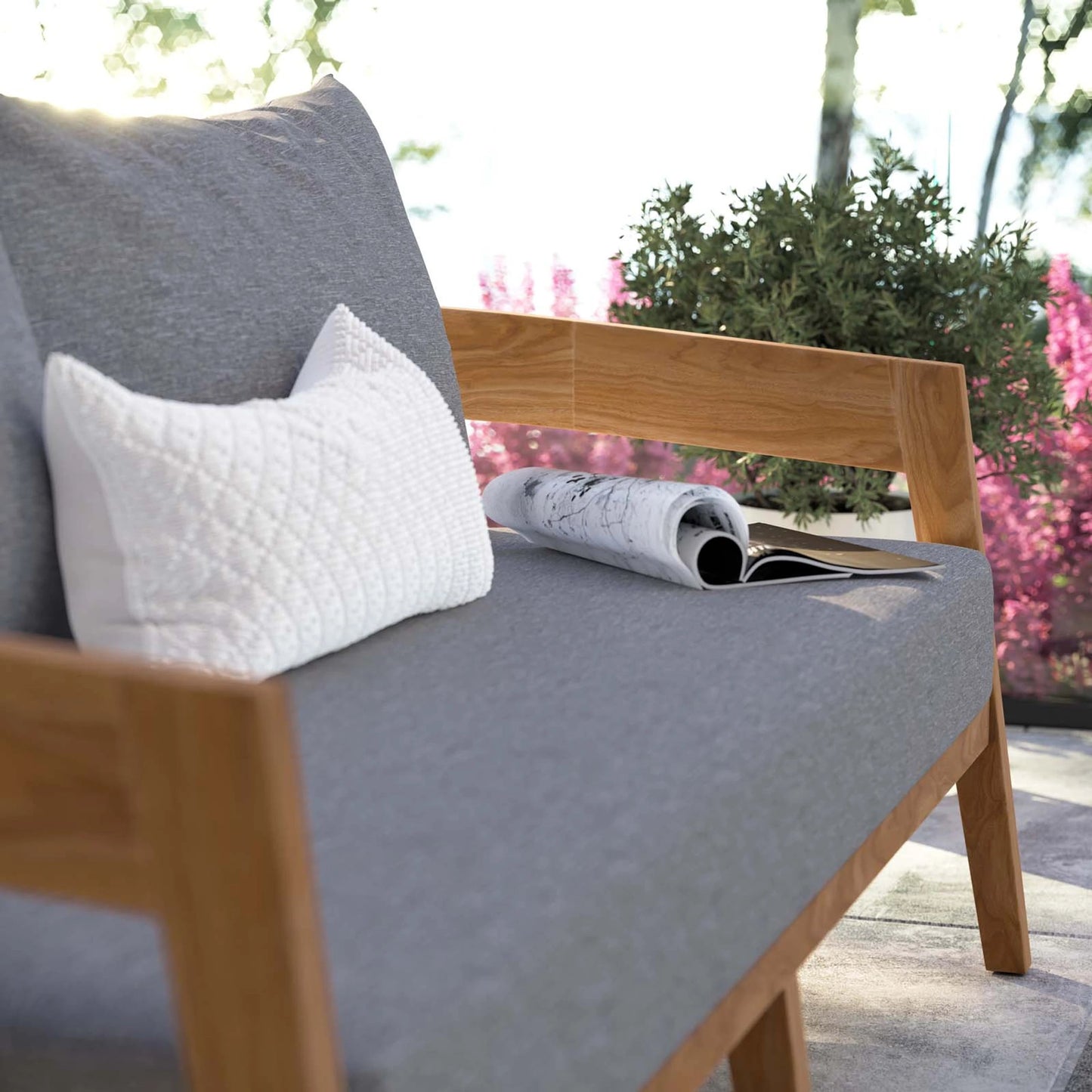 019 SI-1929578 | Lifestyle | Hazelton Teak Wood Loveseat by Evans & Londeen. Made from teak wood, polyester, mesh sling, plastic tack glides, stainless steel in a modern style.