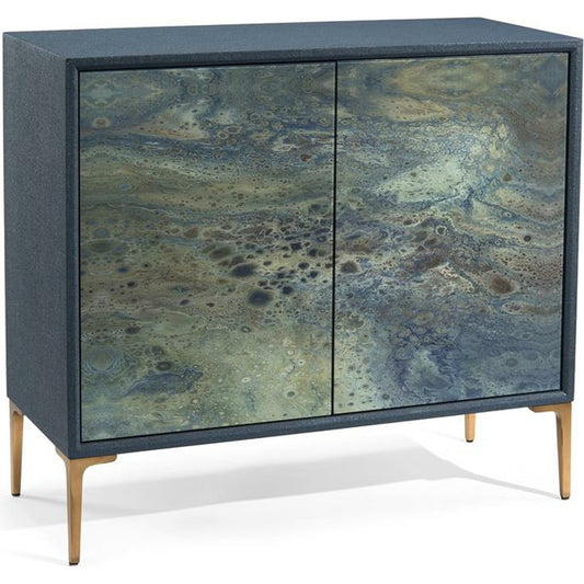 001 SR-865656 | Primary Silo | Shaye Rawson's Pavo Cabinet by John-Richard in indigo. Made from glass, metal in a coastal style.