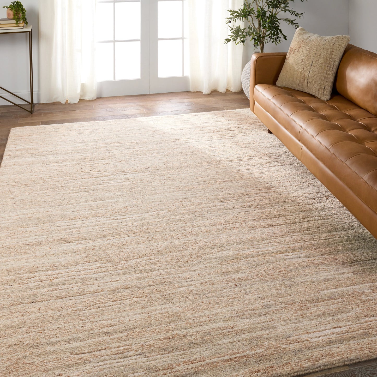 005 SI-1973463,SI-1973464,SI-1973465,SI-1973466,SI-1973467 | Lifestyle | Farida Jameel FIA01 Rug by Jaipur Living in cream, beige. Made from 75% wool 25% viscose in a unique style.