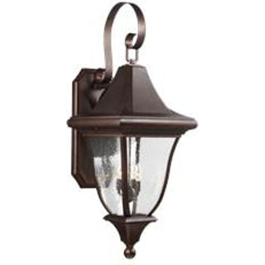 Oakmont Outdoor Wall Lantern by Generation Lighting in patina bronze. Made from cast aluminum in a traditional style.
